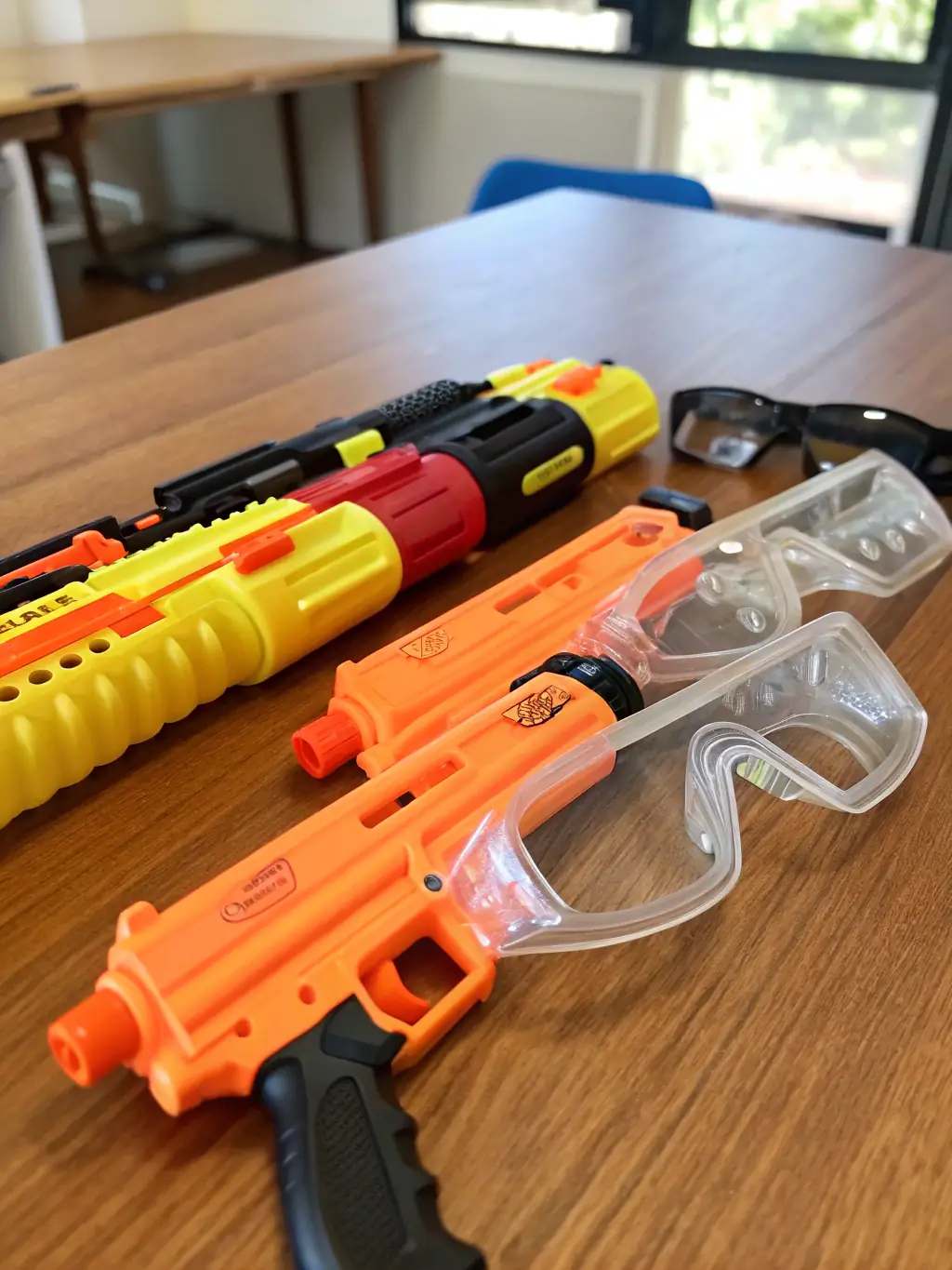 A close-up shot of airsoft equipment, including rifles, protective gear, and tactical vests, emphasizing the importance of safety and responsible use of equipment in airsoft activities.